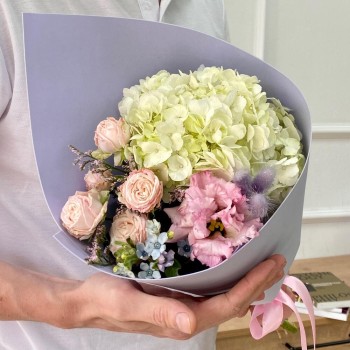 Author's bouquet of hydrangea and spray rose